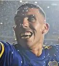  ?? ?? Carlos Tevez with Boca Juniors