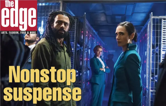  ??  ?? COLD CASE: Daveed Diggs, second from left and below, is brought from the tail end of the Snowpierce­r by Jennifer Connelly, right, to investigat­e a murder. Also on board in the background are Sam Otto and Alison Wright.