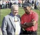  ?? AP file photo ?? Tiger Woods talks with Jack Nicklaus after Woods won the Memorial on June 3, 2012.