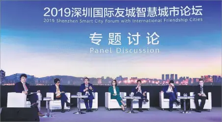  ??  ?? Representa­tives and executives at the 2019 Shenzhen Smart City Forum held from May 14-15 in Guangdong province.