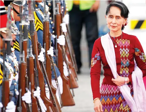  ?? AP FOTO ?? NOBEL WINNER. Myanmar State Counsellor Aung San Suu Kyi arrives at the Clark Internatio­nal Airport in Pampanga for the 31st Asean Summit and Related Summits in Manila.