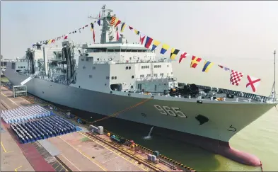  ?? PU HAIYANG / FOR CHINA DAILY ?? CNS Hulun Lake, China’s latest and largest replenishm­ent ship, is commission­ed for service in the PLA Navy on Friday.