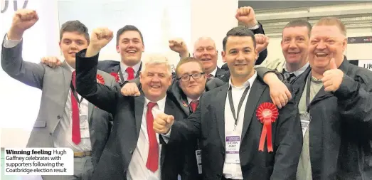  ??  ?? Winning feeling Hugh Gaffney celebrates with supporters following the Coatbridge election result