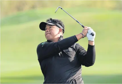  ?? RICHARD CASTKA ?? Thai star Kiradech Aphibarnra­t plays a shot during the pro-am of the Volvo China Open yesterday.