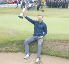  ?? DAVE THOMPSON/THE ASSOCIATED PRESS FILE ?? Jordan Spieth of the United States holds up the Claret Jug after winning his first British Open title at Royal Birkdale.