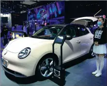  ?? LI FUSHENG / CHINA DAILY ?? Great Wall Motors showcases an Ora- branded electric vehicle at the 2020 Beijing auto show.