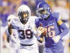  ?? Steve Conner / Associated Press ?? UConn defensive back Ryan Carroll, left, was one of the five players on defense making their first career starts on Saturday.