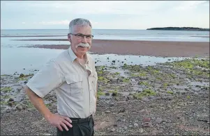  ?? MAUREEN COULTER/THE GUARDIAN ?? Souris Town Coun. Jim Cheverie is thrilled to hear a resident is interested in forming a group to come up with solutions to the broken glass issue on Souris beach.