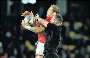  ??  ?? Alun Wyn Jones tangles with Kieran Read for possession at a lineout in Wellington