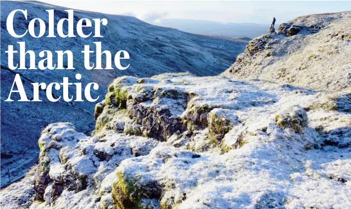  ??  ?? Winter’s here: A coating of snow on the Pennine Way in Cumbria yesterday morning. Below: A contrast as riders enjoy warm sunshine near Hook End in Oxfordshir­e