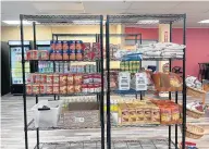  ?? ?? Food items await patrons on shelves at Free N Deed Market in Dolton, where nutrition and financial workshops and other events also are planned.