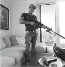  ??  ?? Rayne Russell is seen here posing with a high-powered rifle on an Instagram post. He attracted unwanted attention after the post was considered a terror threat aimed at the Ultra Music Festival in Florida.