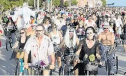  ?? ROB O’NEAL/AP 2015 ?? Key West’s annual “Zombie Bike Ride’’ draws more than 6,000 visitors.