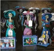  ??  ?? Day of the Dead items for sale at Barrio Antiguo, the store sells ready-made furniture, custom made furniture and home accessorie­s.