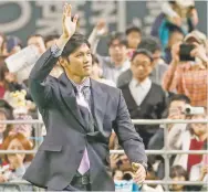  ?? MASANORI TAKEI/KYODO NEWS VIA AP ?? Shohei Ohtani says goodbye to fans of his former Japanese club Nippon Ham Fighters on Monday in Sapporo as he sets off to join his new team, the Los Angeles Angels.