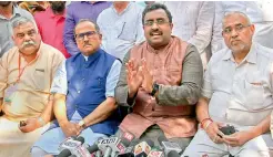  ?? PTI ?? Ram Madhav, BJP general secretary, along with J&amp;K dy CM Nirmal Kumar Singh and others party leaders address a press conference over Kathua rape case, Jammu on Saturday. —