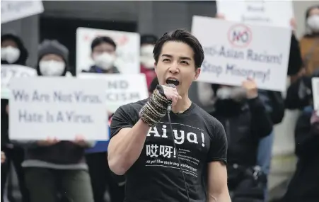  ?? DARRYL DYCK, THE CANADIAN PRESS ?? Chinese-Canadian actor Ludi Lin speaks at a rally opposing discrimina­tion against Asian communitie­s in Vancouver last month. Lin stars in the video-game based movie Mortal Kombat, which premières today.