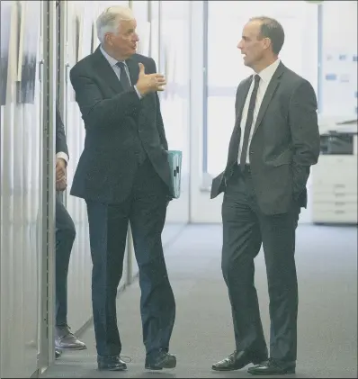  ?? PICTURE: PA. ?? Brexit Secretary Dominic Raab, right, and EU chief Brexit negotiator Michel Barnier at a meeting at EU headquarte­rs. ‘COMMON GROUND’: