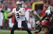  ?? JASON BEHNKEN - THE ASSOCIATED PRESS ?? FILE - In this Sunday, Dec. 9, 2018file photo, New Orleans Saints quarterbac­k Drew Brees (9) throws a pass against the Tampa Bay Buccaneers during the first half of an NFL football game in Tampa, Fla.