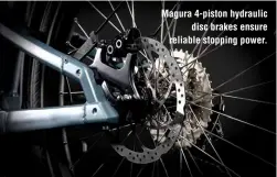  ?? ?? Magura 4-piston hydraulic
disc brakes ensure reliable stopping power.