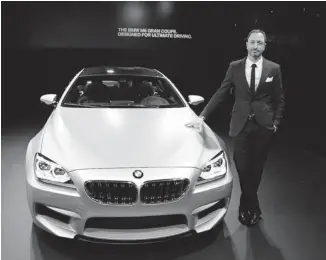  ?? KEVIN MIO/POSTMEDIA NEWS ?? Besides the 4 Series concept debut at the Detroit Auto Show, BMW unveiled its 560 hp V8-powered M6 Grand Coupe, which design head Karim Habib, above, called ‘pure sportiness and pure elegance’ in one package.