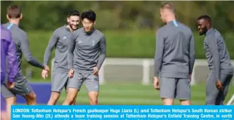  ??  ?? LONDON: Tottenham Hotspur’s French goalkeeper Hugo Lloris (L) amd Tottenham Hotspur’s South Korean striker Son Heung-Min (2L) attends a team training session at Tottenham Hotspur’s Enfield Training Centre, in north London yesterday, ahead of their UEFA Champions League Group B football match against Bayern Munich. — AFP