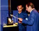  ??  ?? IWC’S Stanislas Rambaud explains to a VIP customer Raymond Ronquillo the features of the new Pilots’ Watches.