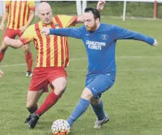  ??  ?? Ryhope Foresters (stripes) battle against RCA Grangetown Florists.