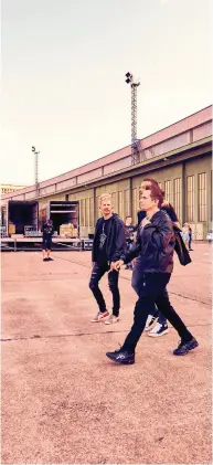  ?? ?? Brotherly bond: Muse prepares to step on stage at Tempelhof Sounds festival, Berlin