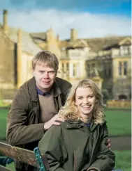  ??  ?? Julie with her husband Luke, the future Earl of Sandwich, in the grounds of Mapperton