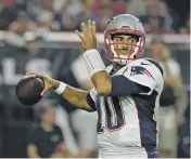  ?? ASSOCIATED PRESS FILE PHOTO ?? With backups quarterbac­ks like the New England Patriots’ Jimmy Garoppolo, pictured, along with Mike Glennon, A.J. McCarron and Colt McCoy possibly on the move this offseason, the task for talent evaluators will be figuring out which group best fits...