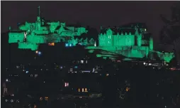  ??  ?? Edinburgh Castle was lit green for Climate Week.