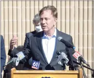  ?? H John Voorhees III / Hearst Connecticu­t Media ?? Gov. Ned Lamont speaks after visiting a COVID-19 vaccinatio­n clinic for staff of local child care providers at Rodgers Park School in Danbury earlier this month.