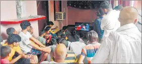  ?? HT PHOTO ?? Villagers of UP’s Pachauta gathered at Satish Kumar’s residence to watch the bout.