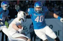  ??  ?? Courtesy of Boise State Sports Informatio­n Windsor’s Tyrone Crawford, right, who plays with the Boise State Broncos, is projected as a third-round NFL draft pick. He’ll come home to watch the draft with his mom and brother.