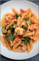  ??  ?? Enjoy penne congamberi­e zucchini at Sopra Sotto on Commercial Drive.