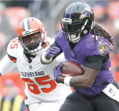  ?? | GETTY IMAGES ?? Running back AlexCollin­s has settled into the featured role in Baltimore, ranking 10th in the league with 844 rushing yards.