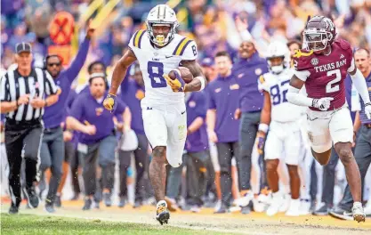  ?? SCOTT CLAUSE/USA TODAY NETWORK ?? LSU’s Malik Nabers runs after a catch against Texas A&M during a game last season.