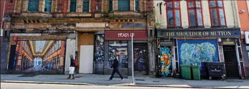  ??  ?? City centre decay: Boarded up properties on Swansea’s high street, where yet another business closed last night