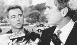  ?? Associated Press file photo ?? Wayne Slater of the Dallas Morning News’ Austin bureau listens to then-Gov. George W. Bush in 1997. Slater died Monday in an auto accident. He was 74.