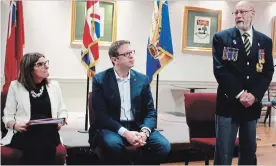  ?? RICHARD HUTTON METROLAND ?? Federal Minister for Seniors Filomena Tassi, left, and St. Catharines MP Chris Bittle listen as Royal Canadian Legion, Branch 124 president Al Howse speaks at a roundtable event.