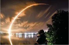  ?? MALCOLM DENENARK Florida Today ?? A three-minute time exposure shows the launch of a SpaceX Falcon 9 from Cape Canaveral earlier this month. The rocket carried a satellite for Turkey.