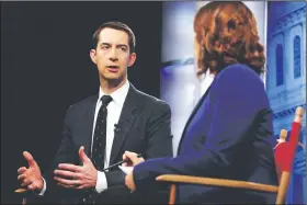  ?? AP/JACQUELYN MARTIN ?? The Chinese government has “been playing both sides of the street,” U.S. Sen. Tom Cotton, R-Ark., said Thursday. On the subject of sexual-harassment claims in Washington, Cotton declined to say whether he thinks equal standards apply in all cases.