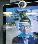  ?? Picture: Gilles Sabrie/Getty Images ?? Xu Li, CEO of SenseTime Group, is identified by the company’s facialreco­gnition system on a screen at SenseTime’s showroom in Beijing .