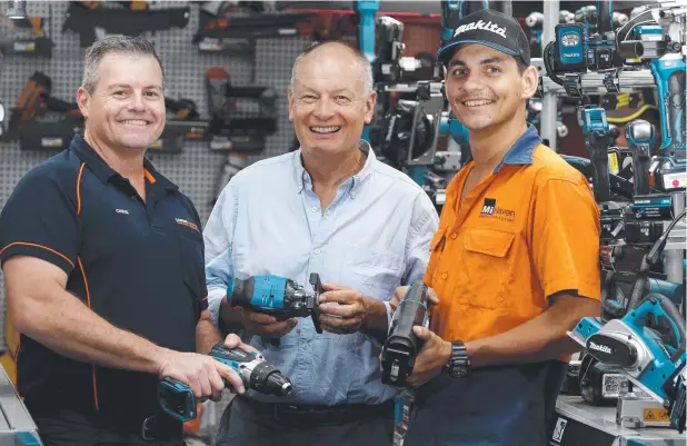  ?? Picture: ANNA ROGERS ?? GOOD TURN: Cairns Hardware sales representa­tive Chris Atkins and MiHaven director James Mort with MiHaven apprentice and HIA Apprentice of the Year Sam Brayshaw, whose tool trailer was stolen just after he won the award. A joint effort provided Mr Brayshaw with the equipment to get back on the job.