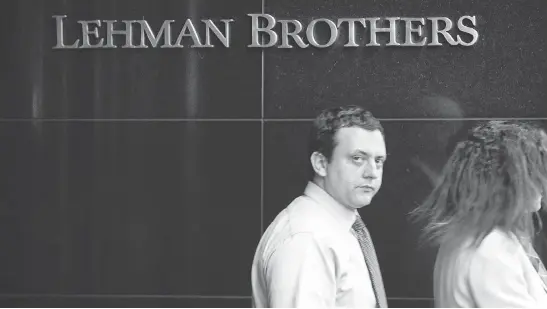  ?? MARIO TAMA / GETTY IMAGES FILES ?? The collapse of Lehman Bros. and the financial crisis of 2008 should have taught that something always has to give, writes Joe Chidley.