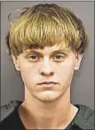  ??  ?? Dylann Roof could not even look at a survivor as she told court Wednesday of his shooting rampage.