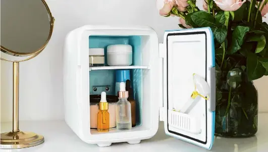  ?? SHUTTERSTO­CK ?? Also called a skincare fridge or a beauty fridge, this trend of putting a minifridge in the bathroom began, naturally, with the beauty industry.