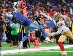  ?? TNS ?? Detroit Lions wide receiver Kalif Raymond (11) makes a catch against San Francisco 49ers cornerback Ambrythoma­s (20) during the second half at Ford Field in Detroit on Sunday, Sept. 12.