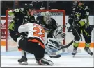  ?? NEWS PHOTO RYAN MCCRACKEN ?? Medicine Hat Tigers winger Tyler Preziuso beats Edmonton Oil Kings goaltender with a wrist shot during the first period of Wednesday's Western Hockey League game at the Canalta Centre.